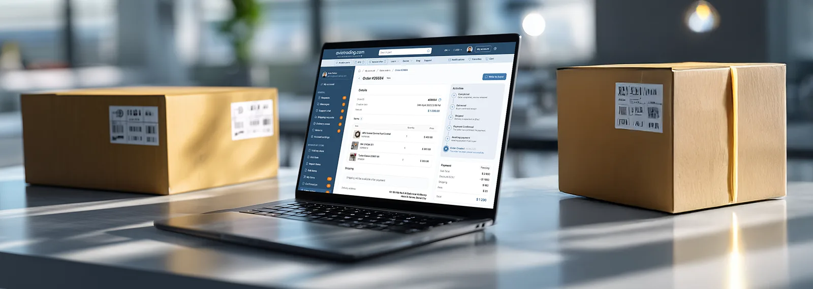 Laptop showing an escrow transaction next to two sealed parcels